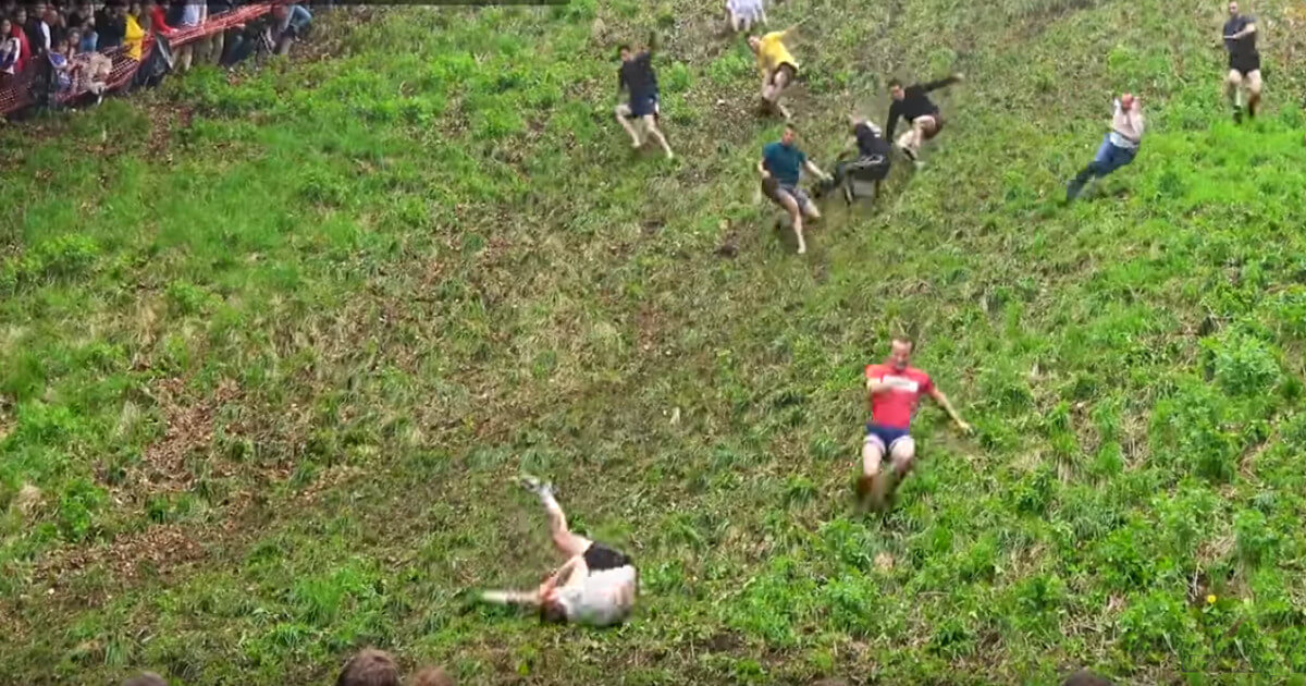 Watch a Downhill Cheese-Chasing Competition in Britain | National Geographic